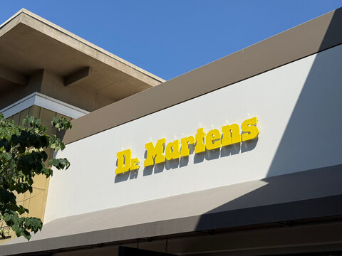 Dr. Martens store sign on a modern retail building beneath a clear blue sky - Livermore, California, USA - August 8, 2026