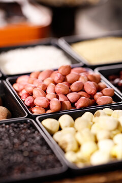 Mixed Grains Peanuts and Health Ingredients in Containers for Therapeutic Cooking and Congee Preparation