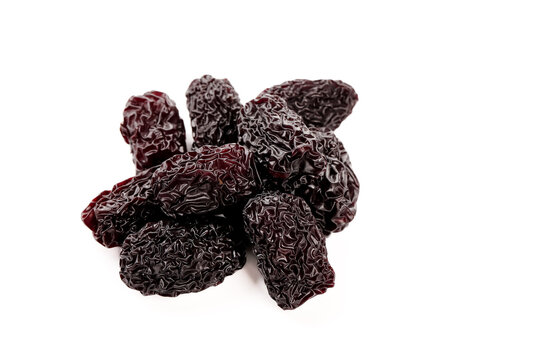 Xinjiang Dried Purple Jujube Fruits - Traditional Chinese Dates on White Background