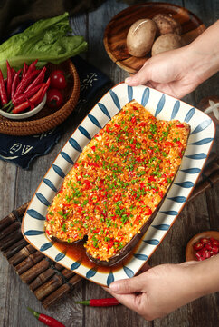 Stuffed Eggplant Asian Dish with Fresh Vegetables and Chili Peppers on Wooden Table