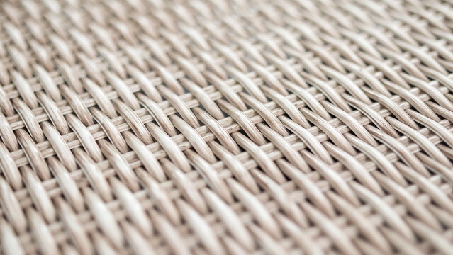light beige wicker weave texture background for furniture and interior design