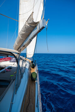 Sailing yacht cruising across the Adriatic Sea under full sail. Freedom and adventure during a long distance sailing voyage.