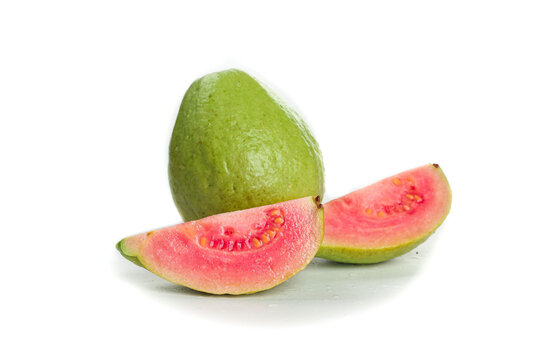 Fresh Red Guava Fruit Slices with Seeds on White Background - Tropical Healthy Food