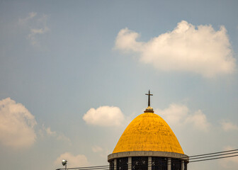 Church Dome with Cross under Cloudy Sky © Andrey