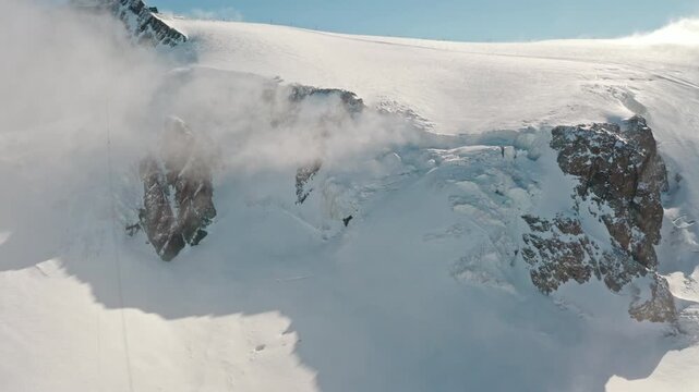 Close-up view of towering glacier seracs and fractured icefall near Matterhorn Glacier Paradise in Zermatt, showcasing the raw and dramatic beauty of the Swiss Alpine glaciers.