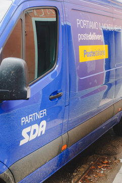 Poste Italiane SDA delivery van transporting packages, focusing on logistics and global distribution services