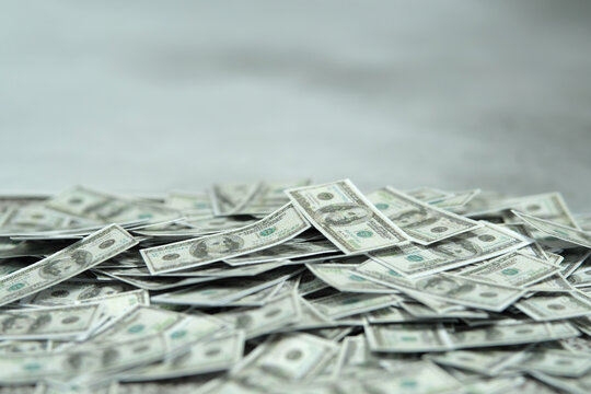 Pile of money with cloudy background. Dismal economics condition concept