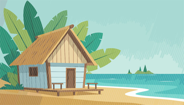 Traditional thatched beach hut stands resiliently on a sandy shore during a heavy tropical rainstorm over the ocean.