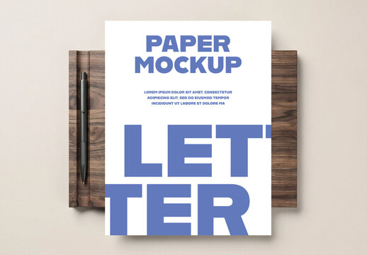 Letter Size Paper Mockup on Wooden Clipboard with Pen Top View