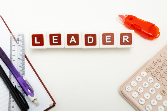 Business organization and administration concept featuring letter blocks spelling &ldquo;MISSION&rdquo; on a clean office desk, surrounded by office stationaries.
