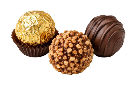 Assorted chocolate truffles with nuts and gold foil