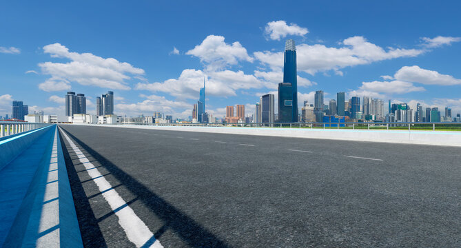 3d rendering empty urban highway leading to modern city skyline