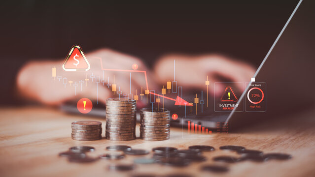 Financial analyst evaluates investment risk, financial loss, market volatility, declining returns, portfolio risk, economic uncertainty, capital loss, investment strategy during a downturn.