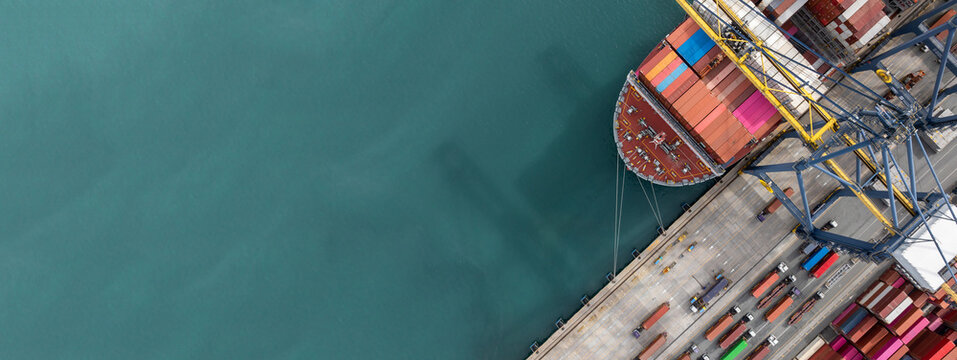 Aerial view Container cargo ship loading unloading container import export sea port, Global trade business container cargo ship freight shipping commercial trade logistic transportation international.