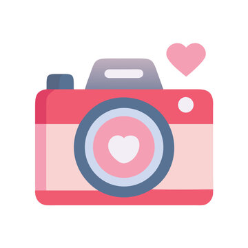 Pink vintage camera with a heart on black background