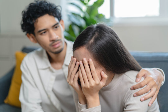 Mental health monitoring and therapy concept. Boyfriend consoling his anxious girlfriend and comforts give her mental support.