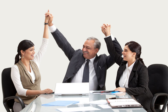Business people enjoying their success together 