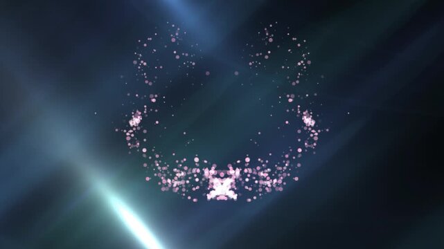 Glowing particles forming an abstract circular crown shape shine brightly against diagonal blue light beams on a dark background.
