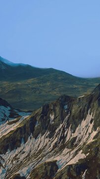 Stunning mountains rise majestically against a clear sky, showcasing peaks dusted with snow. The golden light of dawn illuminates the rugged terrain and verdant valleys below.