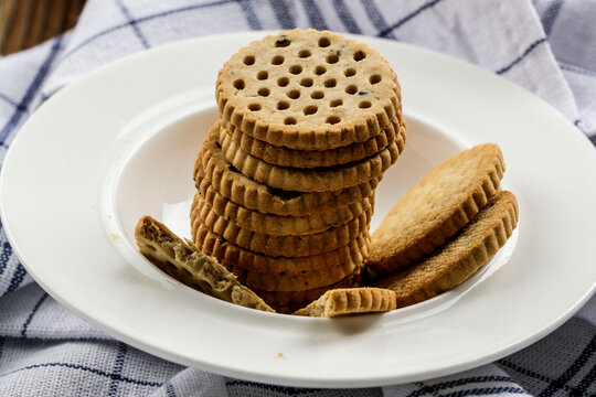 Nutritious and healthy whole wheat oat cookies served on a white porcelain plate