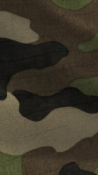 Military Camouflage Fabric Texture Close Up Motion Background.