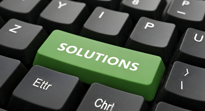 A green computer keyboard key with the word solutions printed on it.