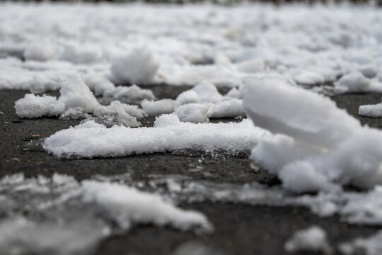 Fresh Snow Covering Asphalt Surface on Winter Day