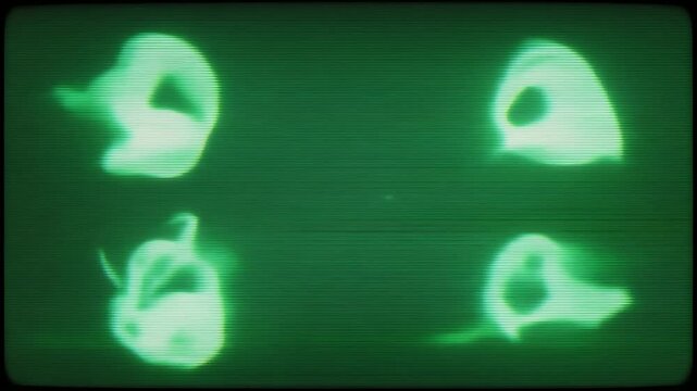 Four amorphous glowing green shapes against a dark background.