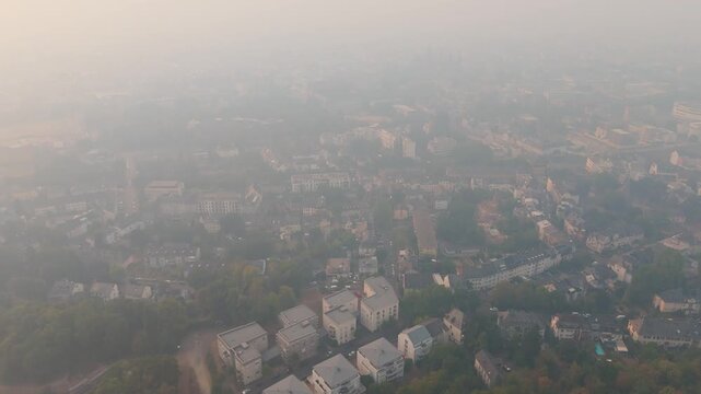 Cloud of smoke drifting toward Trier city, Germany, high fine dust levels, forest fires in High Fens, Belgium and North Rhine Westphalia, wind direction