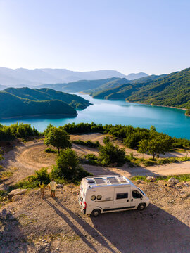 Breathtaking view over Bovilla Reservoir in Albania with a camper van setting