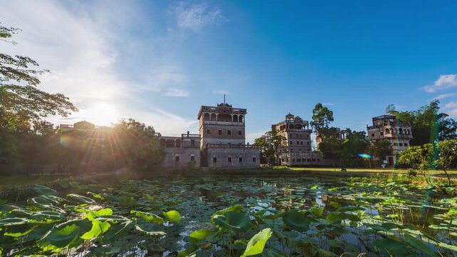 Kaiping Diaolou (watchtowers) Zili Village Diaolou Cluster under the blue sky and white clouds at dawn