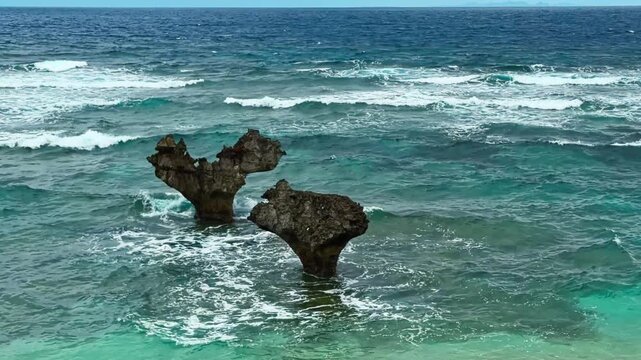 Well-known Heart-shaped Coral Rock Formations Of Tinu Beach On Kouri Island In Nakijin, Okinawa, Japan. Wide Shot