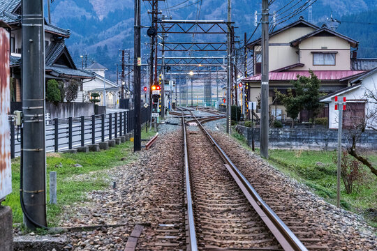 Local Railway Tracks Running Through a Japanese Residential Town