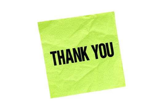 Bright green crumpled sticky note with thank you text written clearly in bold letters isolated