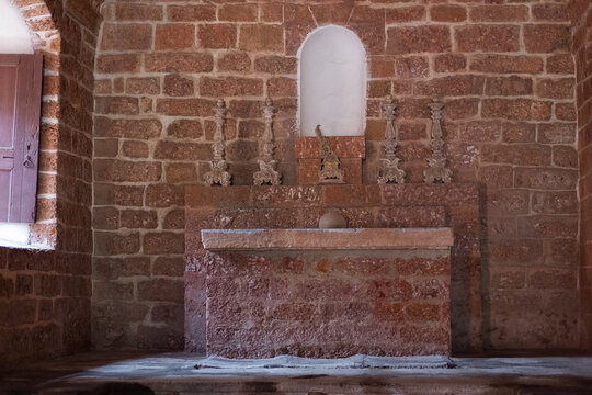 Relics of saints in the red-brick church.