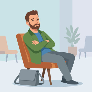 Man sitting in waiting room, looking bored and impatient, with arms crossed and bag by his side.