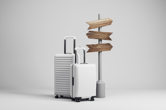 White luggage and wooden directional signpost symbolizing travel, journey, vacation planning, tourism, and finding the right way. 3D Rendering