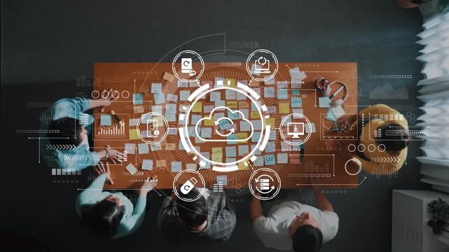 Collaborative Team Meeting with Digital Cloud Interface and Data Visualization Overhead View, Focus on Innovation and Strategy Development in Business Environment. Entropy.