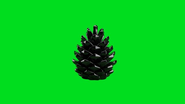 A glossy black pinecone ornament isolated against a bright green background