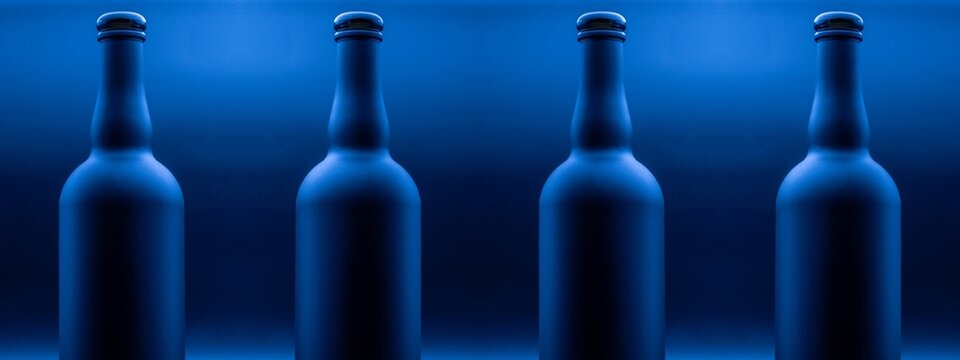 a matte blue wine bottle