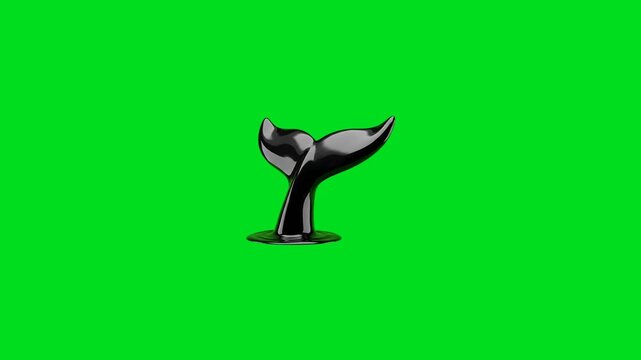 A sleek black whale tail sculpture isolated against a vibrant green background