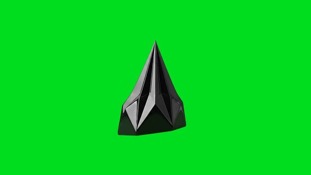 A sharp black geometric pyramid sculpture isolated on a bright green background