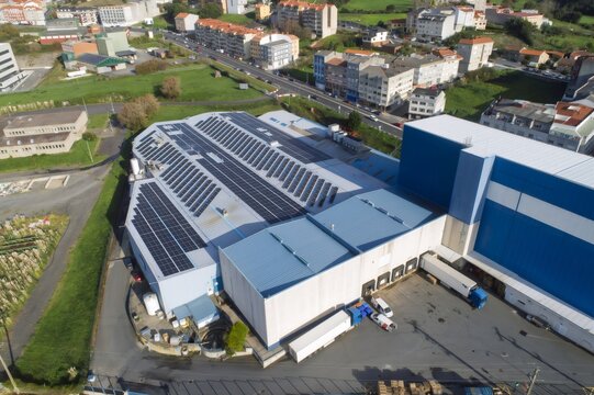 Industrial building generating clean energy with solar panels