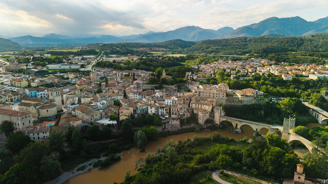 Aerial panoramic view of Besalu medieval town and historic bridge in Catalonia Spain