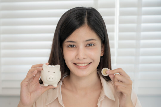 Save money. business woman show coin and piggy bank for saving. wealth, Finance, business, investment, retirement, future, accounting, plan life, economize, banking, family, health.