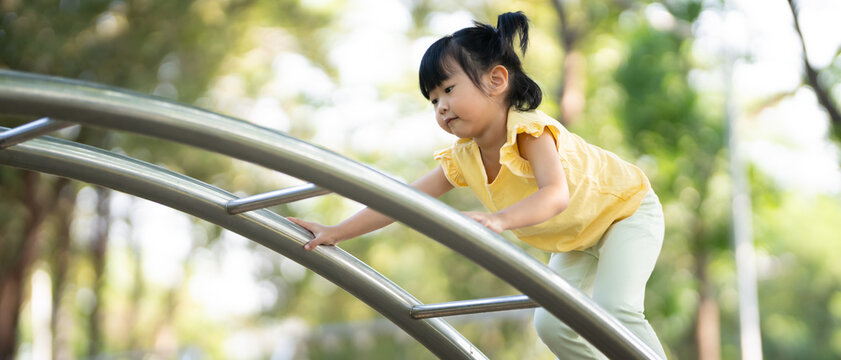 children play in a park on a playground summer day. children playground in a public park, entertainment and recreation for children, holiday, IQ, EQ, Relax, Development