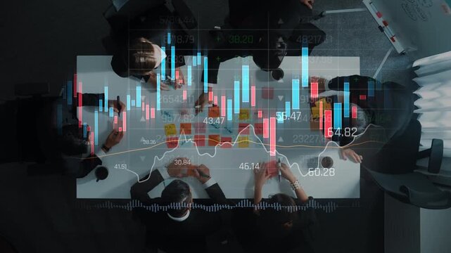 A diverse group of professionals collaborates in a modern office environment, analyzing stock market data through digital graphs and charts for strategic decision-making. Raster
