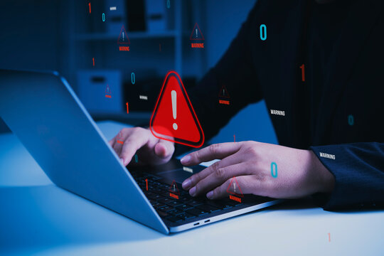 Cybersecurity warning alert with person using laptop to detect digital threats, protect sensitive data prevent cyber attacks manage security risks and strengthen online information protection.