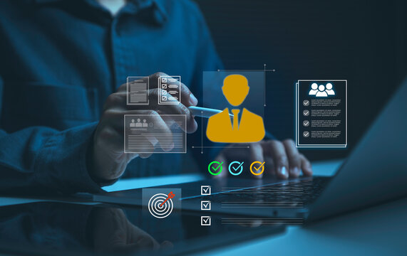 Digital identity verification with person using stylus and laptop to manage profiles validate credentials improve access control support onboarding and strengthen secure workforce management.