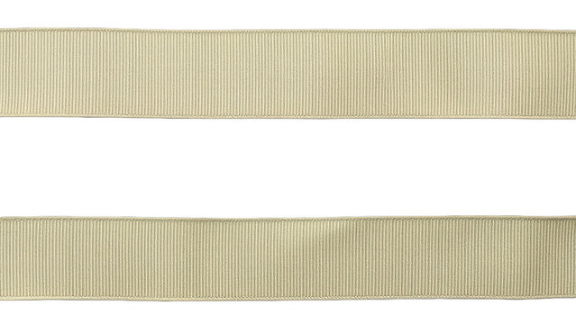 Two horizontal beige fabric ribbons isolated on black